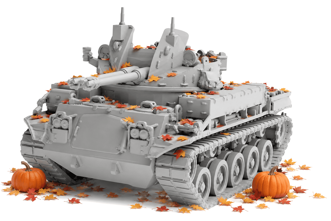 Unpainted grey resin miniature tank render among fallen autumn leaves and pumpkins